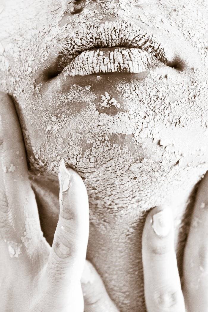 Artistic close-up of a woman's textured skin emphasizing raw beauty and skincare challenges.