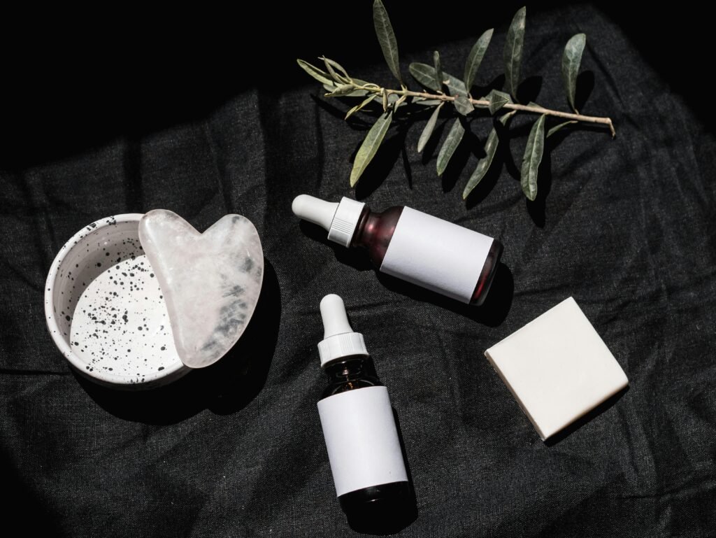 Lightweight gel moisturizer and serum bottles on a clean background for a combination skin care routine.